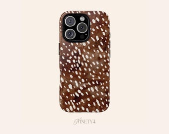 May include: A brown phone case with a white spotted pattern. The case has a glossy finish and a camera cutout with multiple lenses. The brand name "Ninety4" is printed at the bottom.
