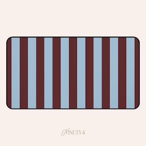 May include: Rectangular design with vertical stripes in maroon and light blue. The rounded corners and the text "NINETY4" in a cursive font are visible at the bottom. The background is a light beige color.