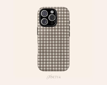 May include: A phone case with a brown and white gingham pattern. The case has a camera module with three lenses and a flash. The brand name "NINETY4" is at the bottom.