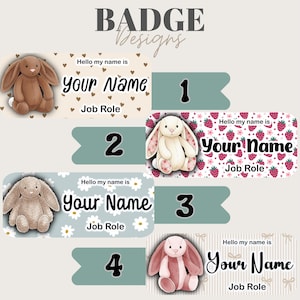 May include: Four name badge designs with bunny illustrations. Each badge has space for a name and job role, with backgrounds of hearts, strawberries, daisies, and stripes. The text "Hello my name is" is above the name field. The word "Designs" is at the top.