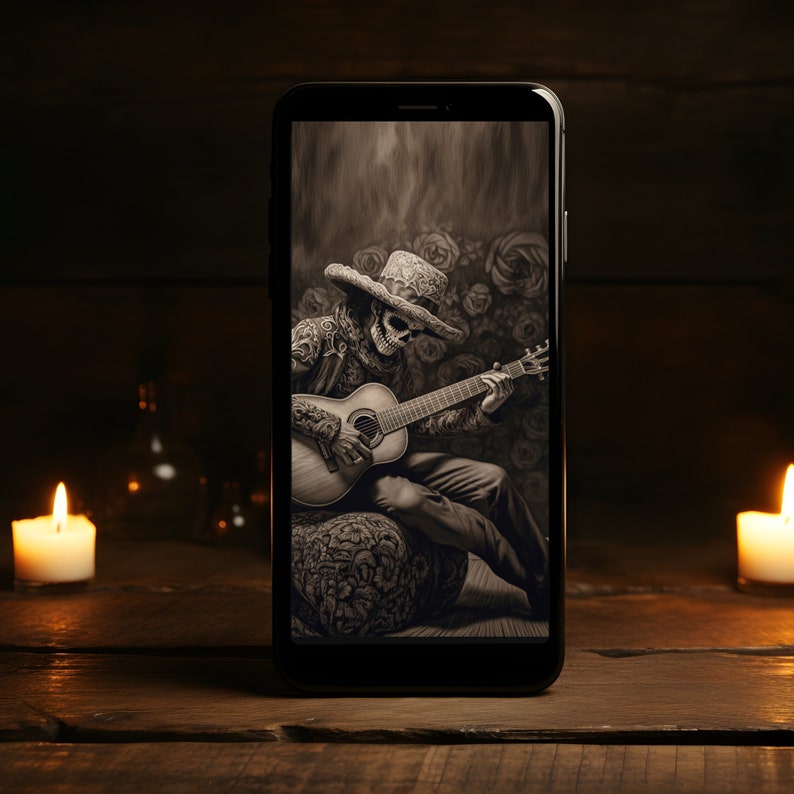 May include: A black and white digital illustration of a skeleton wearing a sombrero and playing a guitar. The image is displayed on a smartphone screen.