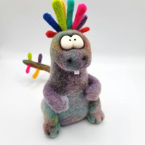 Handmade felt dinosaur Glotz Rex with glowing eyes | Rainbow needle felted | Decorative figure made of fairytale wool | Unique gift idea