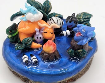 Pokémon decorative scene, Dragon Picnic. Dragonite, Axew, Draschel, Altaria, Gible, Deino, Gobber. Glow in the Dark.