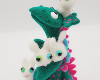 Felt figure, dragon finds new friends