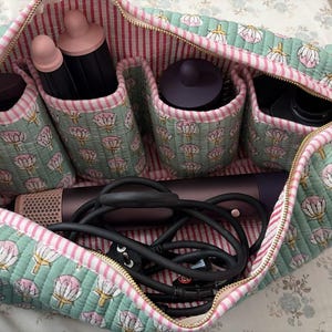 Sage Green quilted organizer for Dyson Airwrap, curling barrels, and hair accessories.