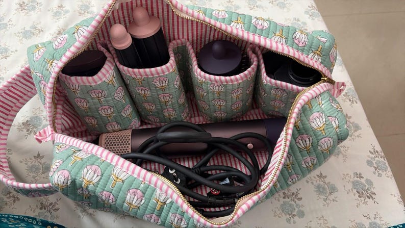 Sage Green quilted organizer for Dyson Airwrap, curling barrels, and hair accessories.