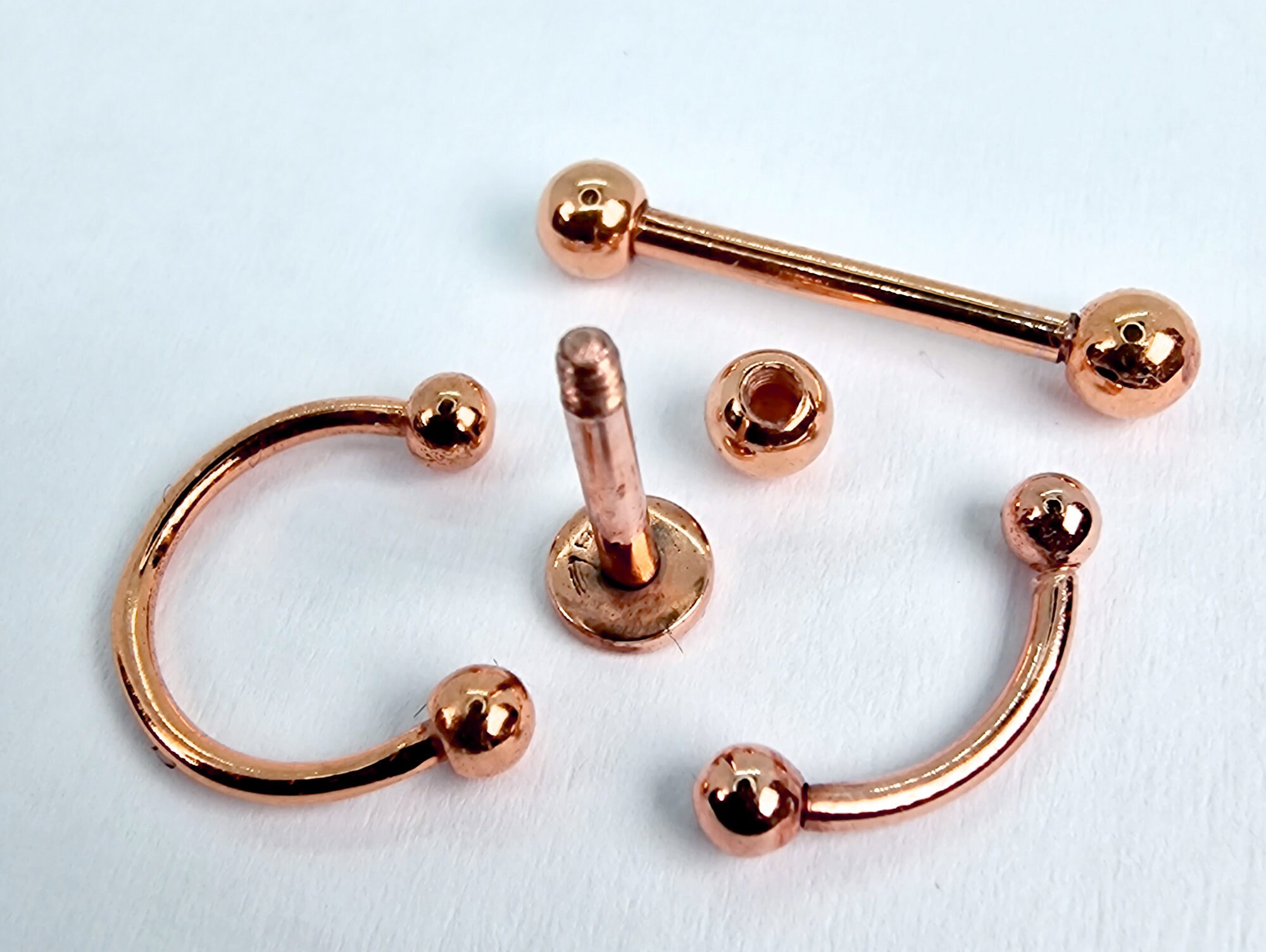 14K Rose Gold Eyebrow Piercing: 16G Curved Barbell Body Jewelry