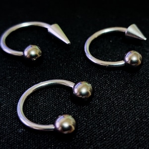 Titanium Horseshoe Piercing: Spike & Ball Septum Ring