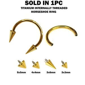 May include: Gold titanium internally threaded horseshoe ring with a choice of five different sized spikes. The spikes are 5x5mm, 4x4mm, 3x6mm, and 3x3mm.