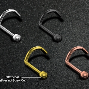 Op de afbeelding: Vier neusringen met vaste balletjes in zilver, zwart, goud en roségoud.