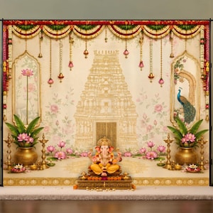 May include: A decorative backdrop featuring a central golden temple illustration, a seated Ganesha statue, hanging floral garlands, brass oil lamps, lotus flowers, and a peacock motif, all set against a cream-colored background with ornate borders.