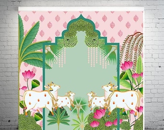 May include: A pink and green backdrop with a decorative archway and floral accents.  The archway is adorned with green leaves and pink flowers.  Three white cows with gold accents are depicted in the foreground.