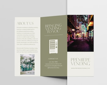 May include: A brochure for Premiere Vending, featuring a vending machine graphic and the text "Bringing Vending to You." The brochure includes contact information and a website address. The background shows a city street.