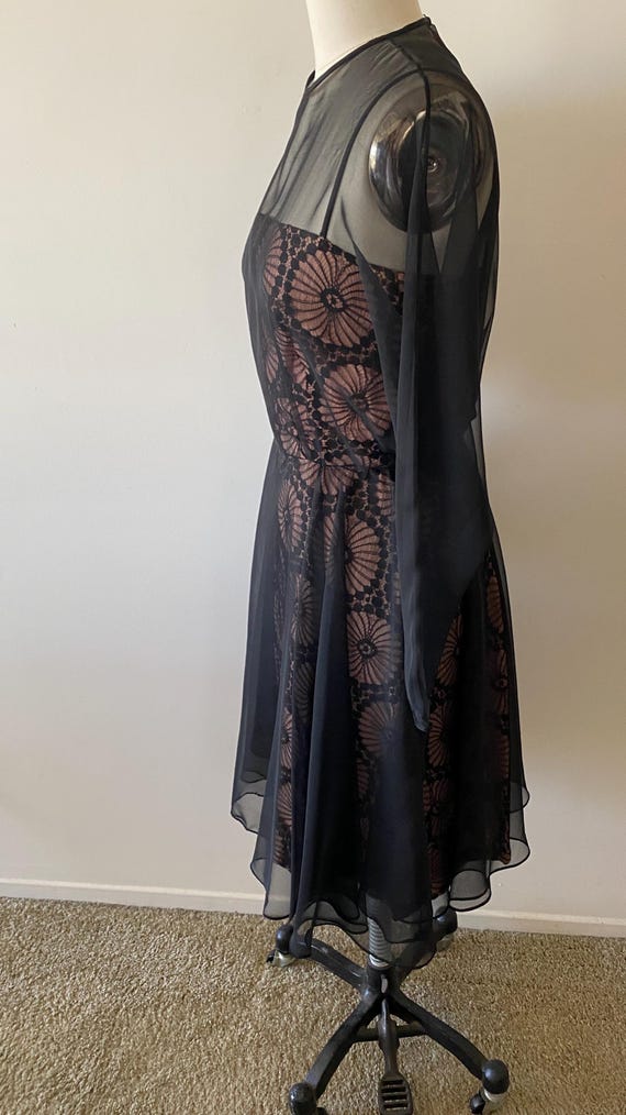 black lace dress with pink underlay Black lace with pink under dress