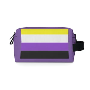May include: Purple, yellow, white, and black striped travel makeup bag with a black zipper and handle.
