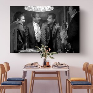 a black and white photo of a group of men in suits
