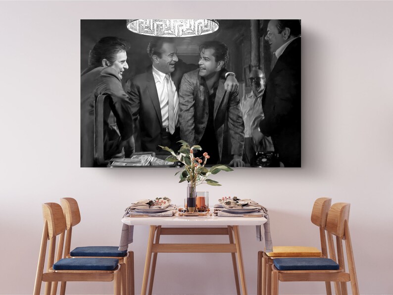 a black and white photo of a group of men in suits