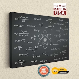 May include: A rectangular black canvas wall art piece featuring white physics and mathematics equations printed across the surface, centered with a white line drawing of an atom. The top right corner includes a red and white MADE IN USA label.