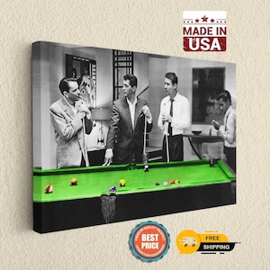 May include: A rectangular canvas wall art print featuring a black and white photograph of three men in suits standing around a vibrant green pool table with colorful billiard balls. The top right corner displays a red and white MADE IN USA logo.