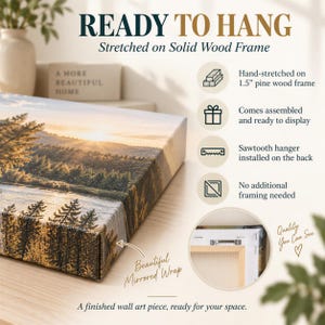 The image is an advertisement for a wall art piece that is ready to hang on a solid wood frame. It features a beautiful landscape painting with a forest scene, and the text highlights the features of the artwork, such as being hand-stretched on a 1.5-foot pine wood frame, coming together, and being a sawtooth hanger installed on the back. The artwork is described as a finished wall art piece, ready for your space, and it is a beautiful mirrored wrap.