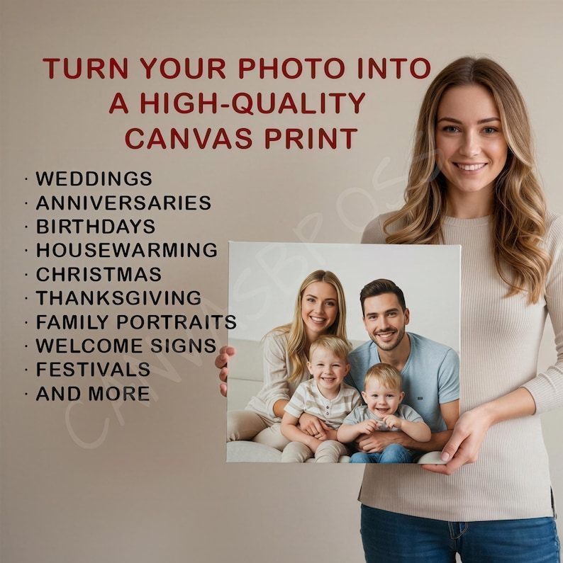 A woman holding a canvas print of a family portrait, smiling and posing for the camera.