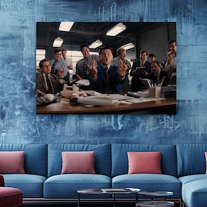 a group of people standing around a blue couch