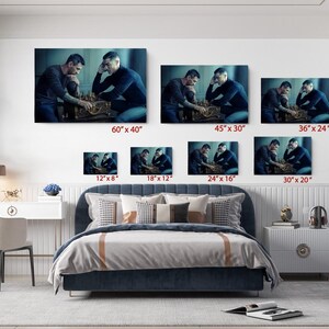 a bed room with a neatly made bed and pictures on the wall