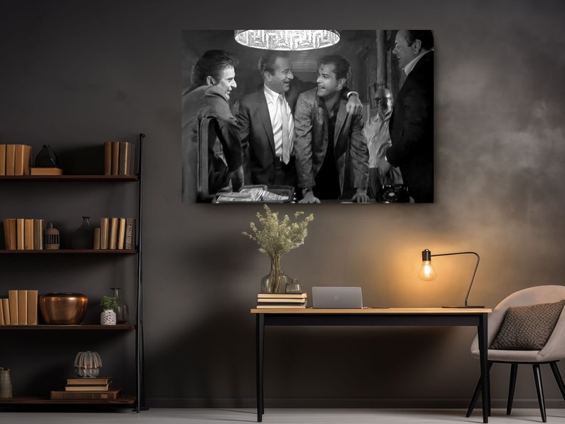 a black and white photo of three men in suits