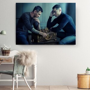 a couple of men playing a game of chess