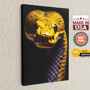 May include: A rectangular canvas wall art print featuring a high-contrast, front-facing portrait of a bright yellow snake with dark, textured scales. The snake is set against a solid black background, highlighting its large, dark eyes and detailed head.