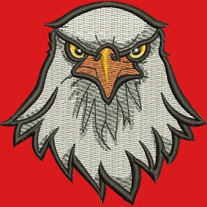 May include: Embroidered eagle head with a stern expression, featuring yellow eyes, a brown beak, and grey and white feathers. The design is outlined in black against a red background. Suitable for clothing and accessories.