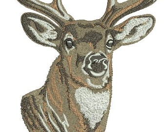 May include: A close-up of a brown and white embroidered deer head with large antlers. The deer is looking directly at the viewer.