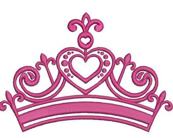 May include: A pink embroidered crown design. The crown features a heart-shaped center with decorative details, swirls, and fleur-de-lis accents. The base of the crown has two parallel lines. The design is suitable for embroidery projects, apparel, or accessories.