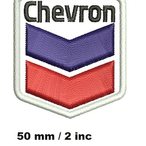 May include: Embroidered Chevron patch with a white border. The patch features the word "Chevron" in black above a blue and red chevron design. The patch measures 2 inches in height.
