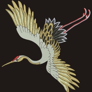 May include: A white and gold embroidered crane with red and black accents. The crane is flying with its wings spread out. The background is black.