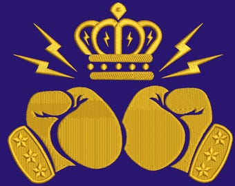 May include: Embroidered design on a navy blue background featuring a gold crown with lightning bolts, gold boxing gloves, and gold star-shaped emblems. The design is likely for apparel or accessories.