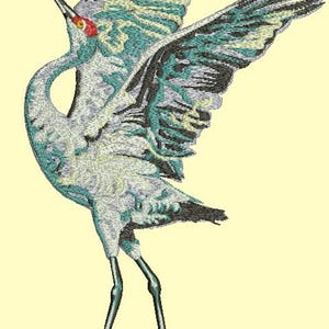 May include: An embroidered crane in flight, featuring a detailed design with shades of white, teal, and black. The bird has a red eye and long, slender legs. The wings are spread wide, showcasing the intricate feather patterns.