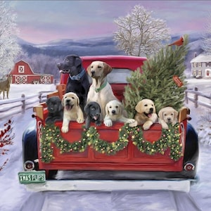May include: A red pickup truck bed filled with eight Labrador puppies and a Christmas tree, decorated with a garland. The truck is driving through a snowy landscape with a red barn and a house in the background. The license plate reads "XMAS PUPS".