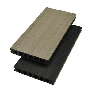 May include: Two composite decking boards, one light brown and one black, are stacked at an angle. The boards have a wood grain texture and several evenly spaced holes along one edge. The boards are designed for outdoor use.