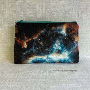 Blue nebula cosmetic zipper pouch and organizer.