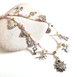 Handmade Charm Necklace: Silver Tone Sun Pendant, Dinosaur, Deathly Hallows, Key, One-of-a-Kind Whimsical Jewellery