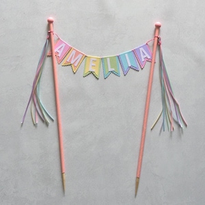 Personalized cake topper bunting-style in pastel shades