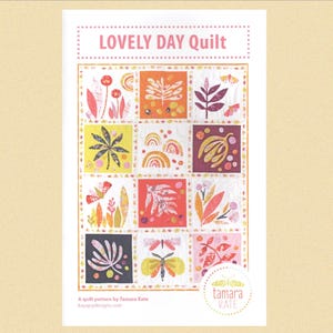 May include: A quilt pattern titled "LOVELY DAY Quilt" featuring colourful squares with floral and leaf designs, butterflies, and rainbows. The pattern is by Tamara Kate and includes the website kayajoydesigns.com.