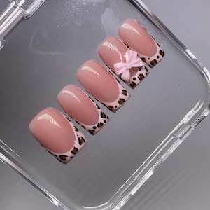 Cheetah print French nails with pink or white bow of your choice