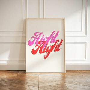May include: A framed print with the text "Aight Aight" in pink and red lettering on a white background.