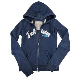 新品Hollister フェイクファートリム ロゴジップアップパーカー S 