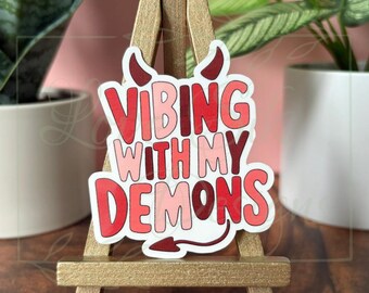 Vibing With My Demons, Funny Sticker: Waterproof Vinyl Decal for Laptop, Water Bottle, eReader