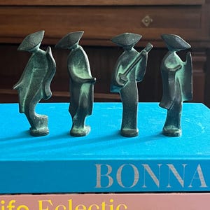 Set of 4 Cast Metal Midcentury “Dancing Geisha” Figurines, made in Japan