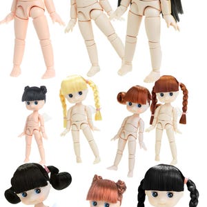 May include: A collection of articulated dolls with various hairstyles, including blonde, black, and red hair. The dolls have blue eyes and small white wings. They are standing in different poses.