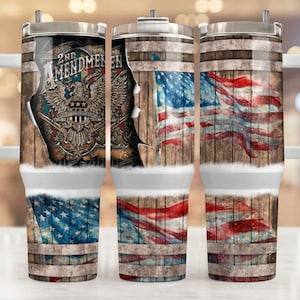 May include: Three stainless steel tumblers with a wood grain design and an American flag design. The tumblers have a handle and a lid. The tumblers are printed with the text "2nd Amendment Right to Bear Arms".